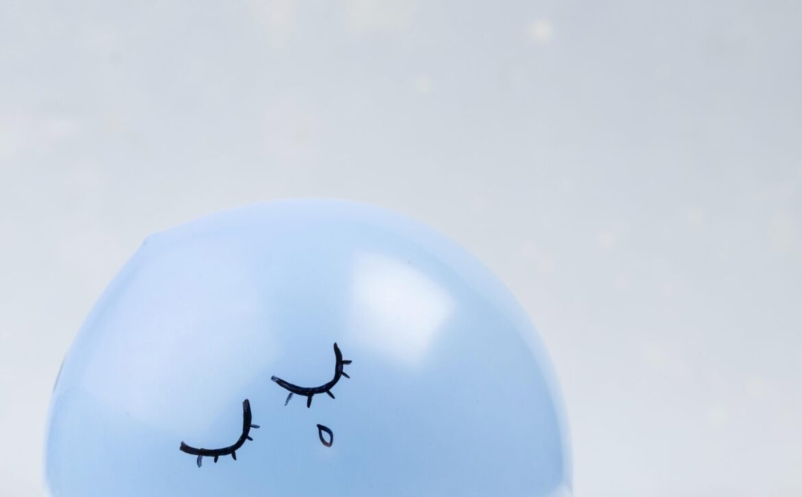 front-view-sad-balloon-blue-monday (1)